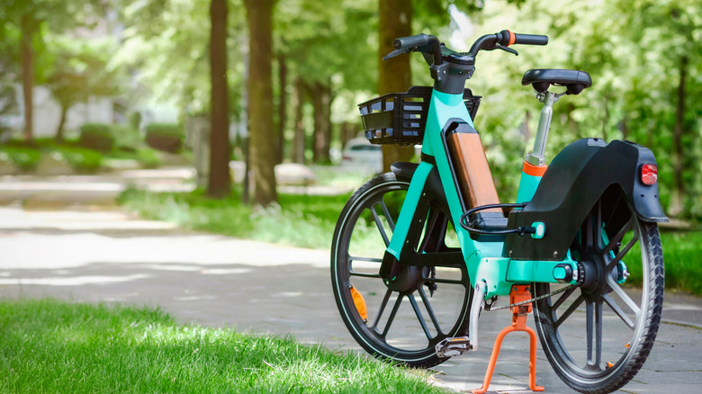 An e-bike sitting on a trail.
