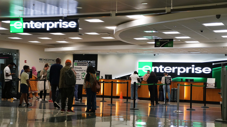 Customers waiting in line to get their reservation at Enterprise Car Rental, Miami Airport