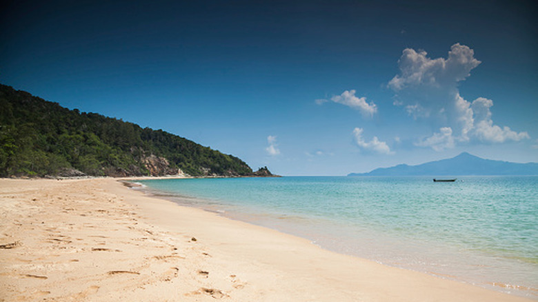 Sandy beach on Sibu Island in Malaysia