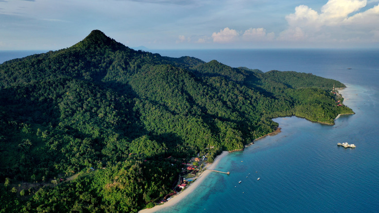 Tinggi Island from above with conical mount Semadu