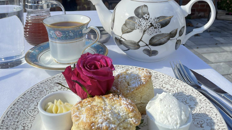 Plate of scones, teacup, and teapot from Florrie Kayes Tea Room.