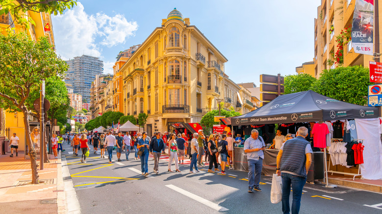 People walking down a street in Monaco