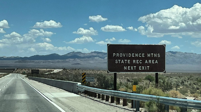 The exit sign for Providence Mountains State Recreation Area