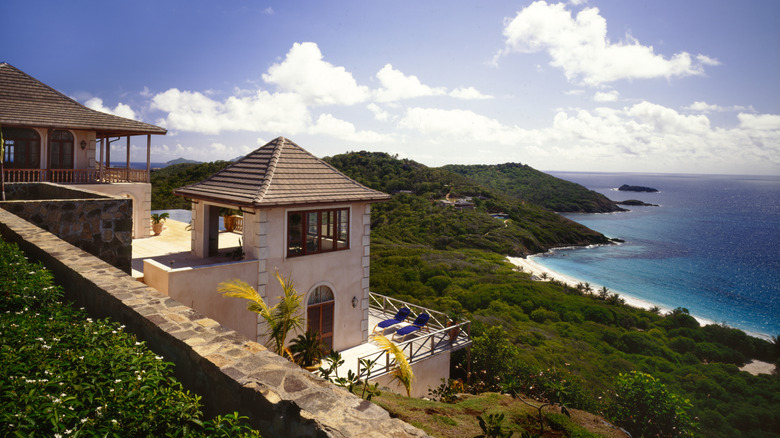 A villa terrace overlooking the beach in Mustique