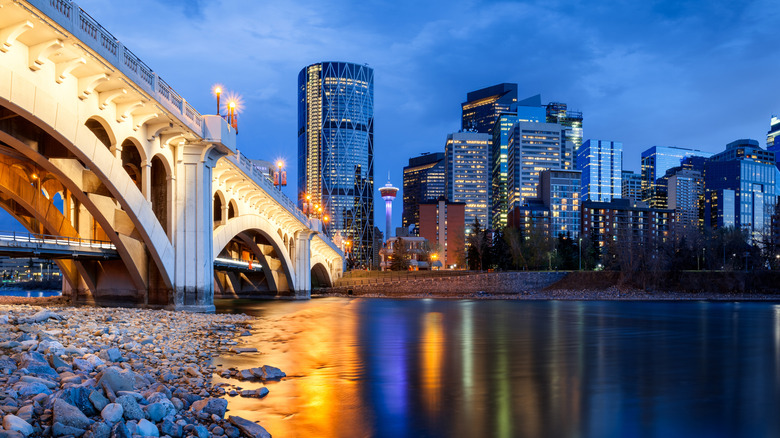Nightscape view of Calgary with bridge in forefront