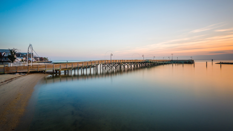 Pier stretches over water in North Beach, Maryland