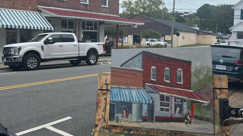 An artists canvas painting of downtown Mathews, Virginia
