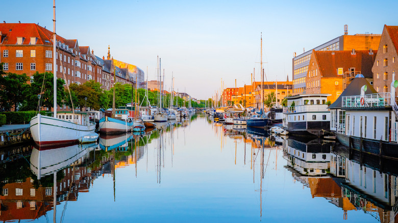 Christianshavn canal lines with sailboats and historic buildings