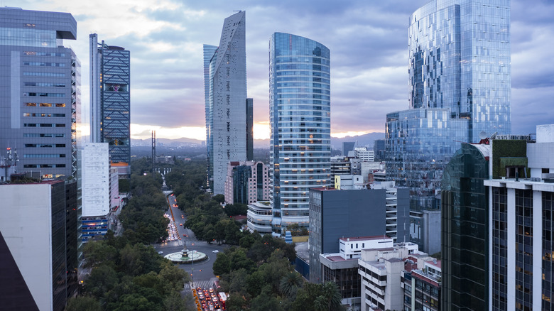 Sky scrapers and the Angel of Independence monument in Mexico City
