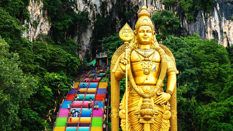 Golden statue at the Batu Caves in Kuala Lumpur
