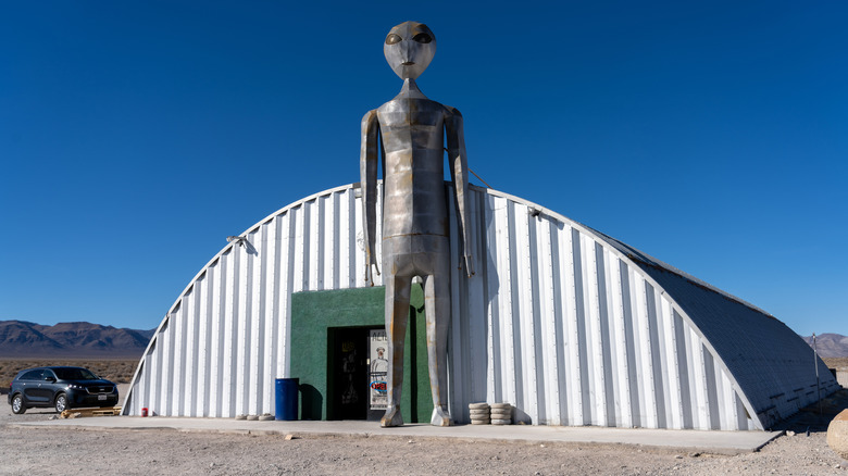 The exterior of the Alien Research Center, an extraterrestrial themed gift shop in Hiko, Nevada, with an alien sculpture