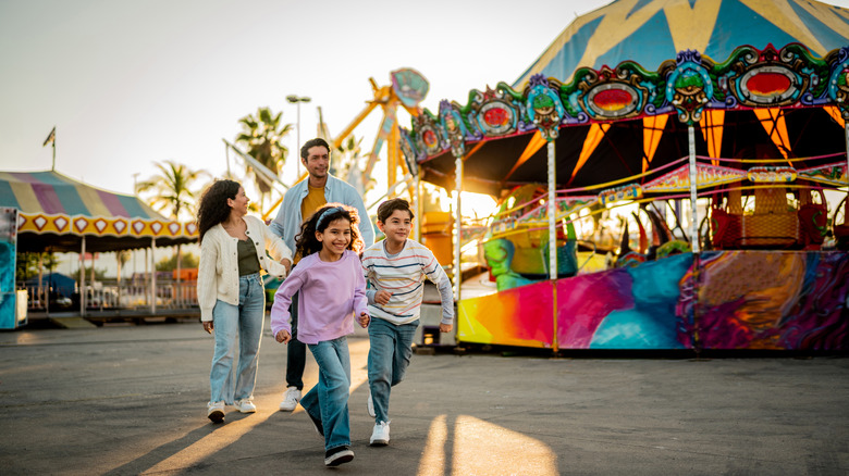 Family of four at theme park