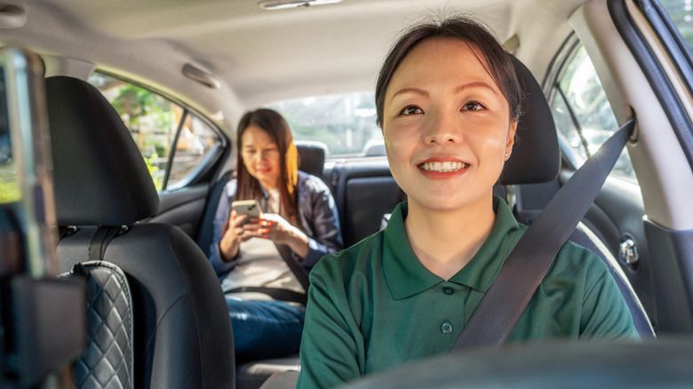 Female passenger with female Uber driver