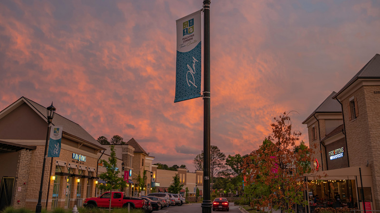 Peachtree Corners, Georgia, street light set against a fiery sky