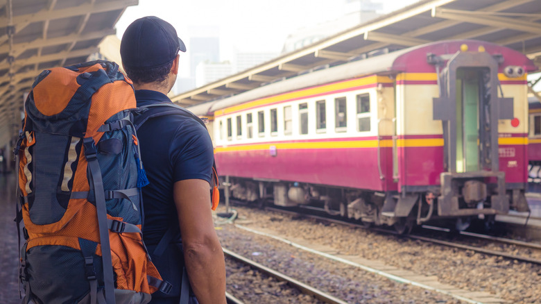 A backpacker at Hua Lamphong railway station in Bangkok.