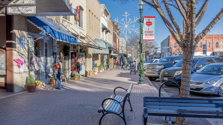 Sidewalk outside of small stores and restaurants in McKinney
