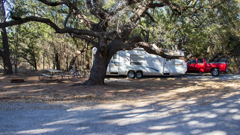 An RV parked at a campsite in Abilene State Park