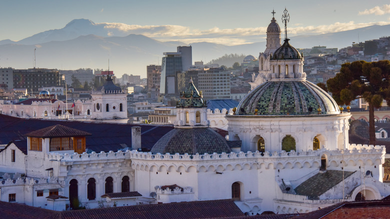 quito cathedral with cotopaxi in distance