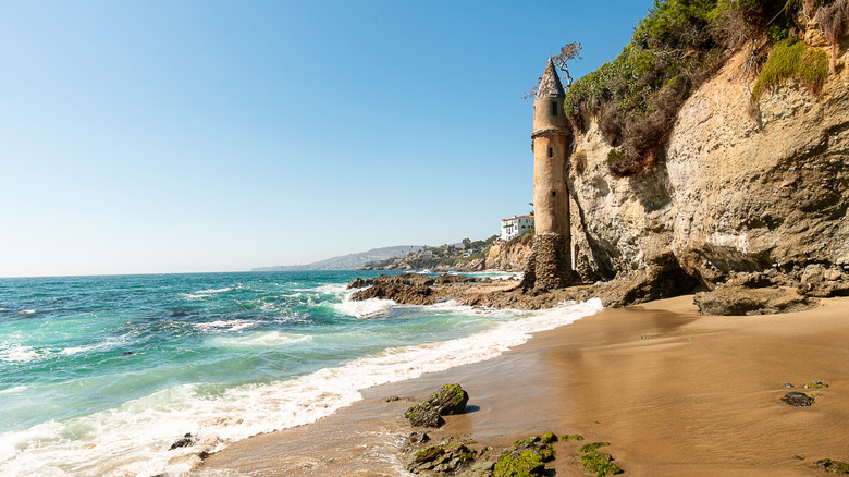 Stone pirate tower on a beach