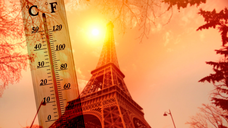 Thermometer and Eiffel Tower in Paris heat wave