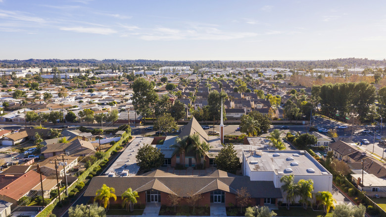 Aerial view of Brea homes, buildings, and trees.