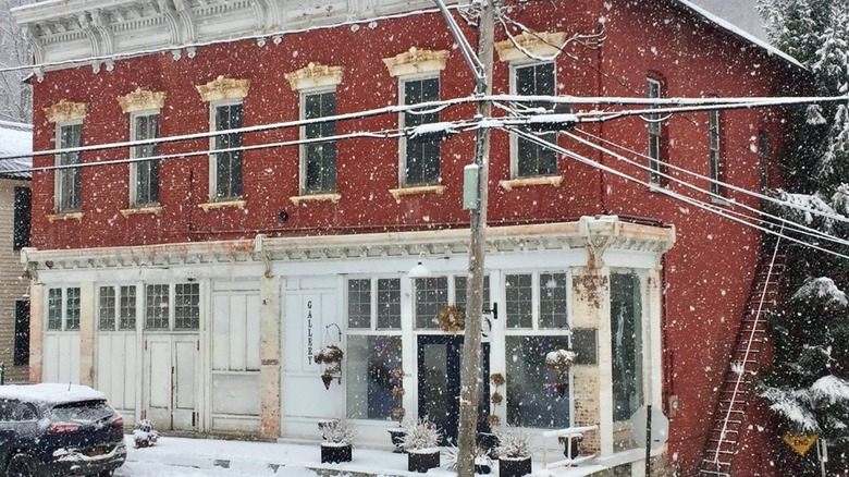 Outside of Klinkhart Hall Arts Center in Sharon Springs, New York in the winter with snow.