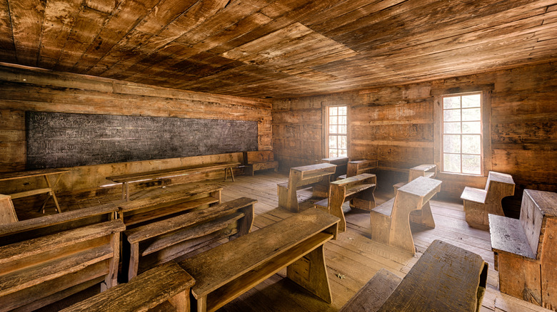Wooden desks and a blackboard inside the Little Greenbrier Schoolhouse in Tennessee