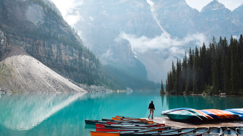 Canoes on the surface of Moraine Lake, Banff, Alberta, Canada