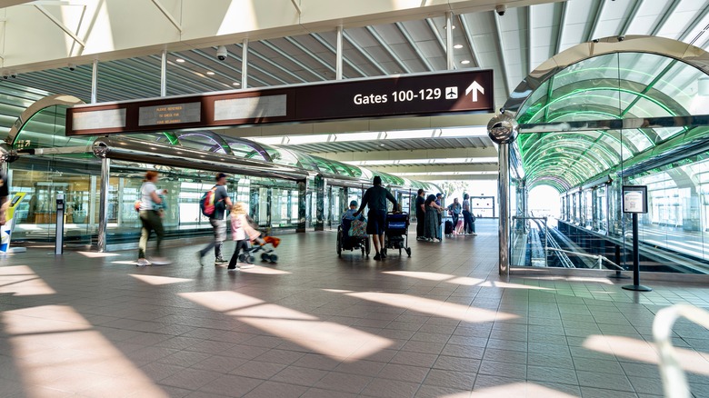 Travelers at Orlando International Airport
