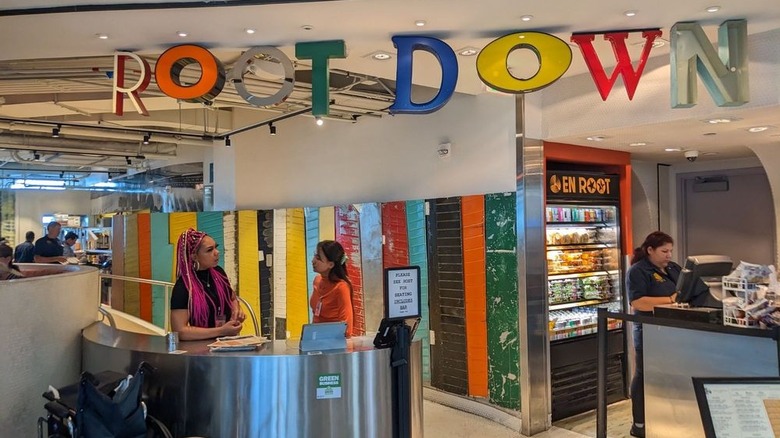 Root Down sign at Denver International Airport