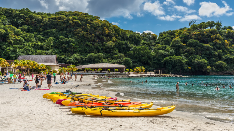 Kayaks parked on the small beach near Buccament Bay