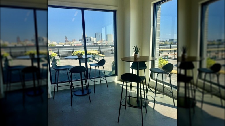 The view from the indoor seating at UpTop, the Indeed Brewing Company's rooftop bar in Milwaukee, Wisconsin