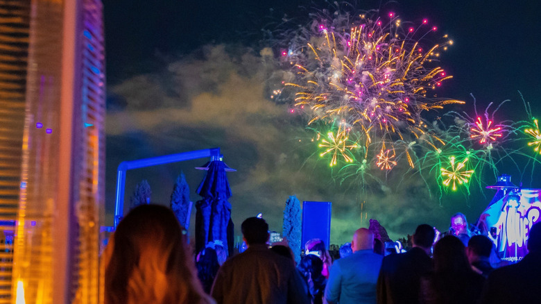 Patrons viewing Disneyland fireworks from The Fifth rooftop