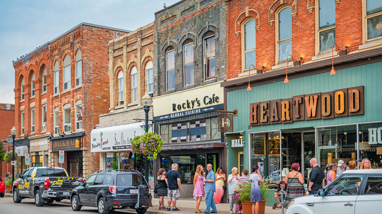 Busy downtown Owen Sound street with historical brick buildings