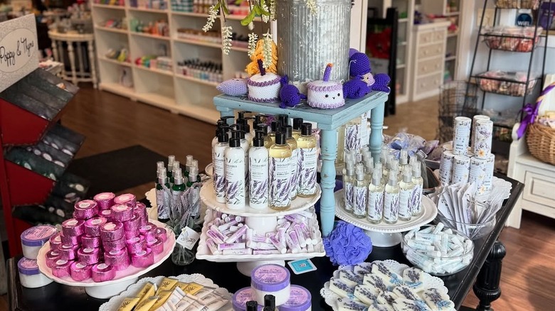 Table with various body products at Poppy & Thyme in Menomonee Falls