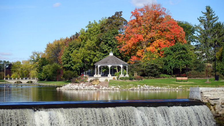 Waterfall, gazebo, and fall foliage in Menomonee Falls