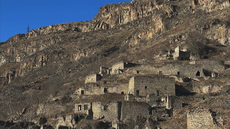 Ruins of abandoned houses on a mountain in Hin Khot, Syunik Province, Armenia