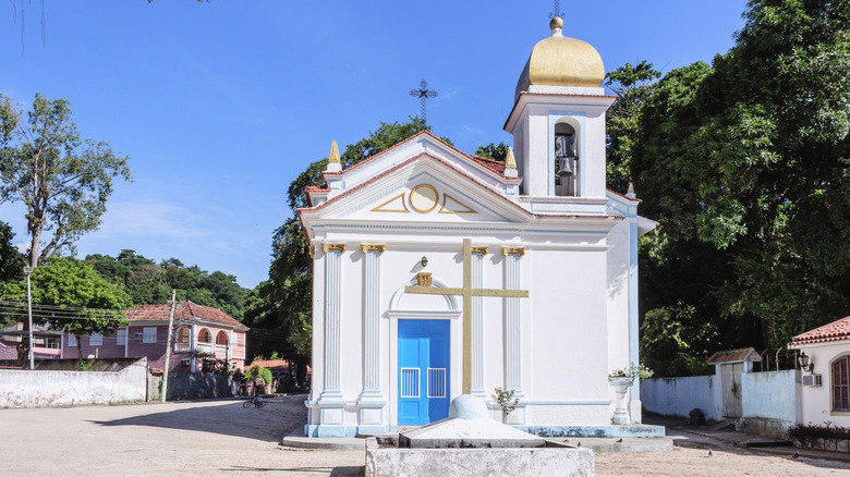 The white and blue São Roque Chapel on Ilha de Paqueta, Brazil