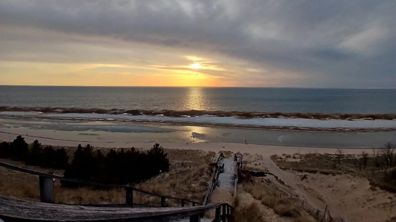 Staircase leading down to the shore at Laketown Beach, Michigan at sunset