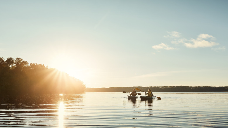 A couple kayaks in the open water