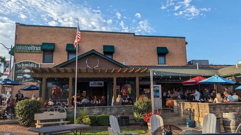 The exterior patio of Schmidt's Towne Tap in the heart of downtown Elburn, Illinois, on a summer evening