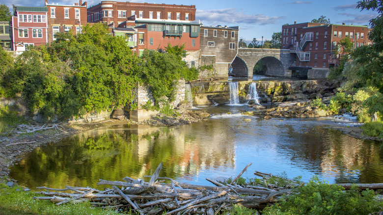 Middlebury Falls during a beautiful day with downtown buildings in background