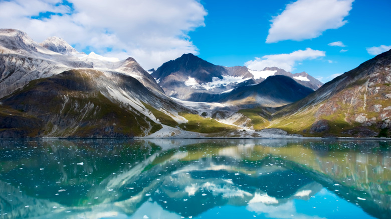 Snow covers the mountains high up in Alaska's Glacier Bay National Park
