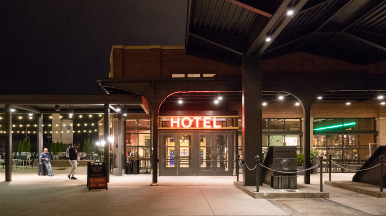 The Central Station Memphis boutique hotel and historic site at night.