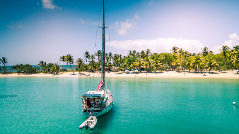 A sailboat anchored off the coast of Mayreau Island