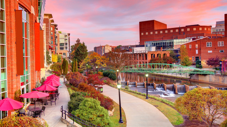 Pink sky over river in downtown Greenville