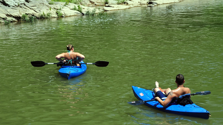 Two kayakers relaxing on the Roanoke River