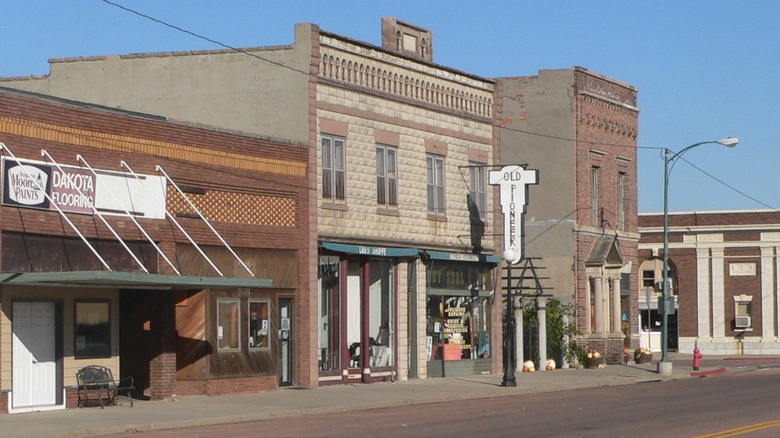 road in Gregory, South Dakota with brick buildings