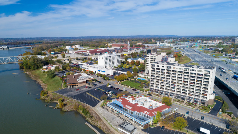 Aerial view of Clarksville, Indiana, with restaurants, hotels, and the Ohio River's shores