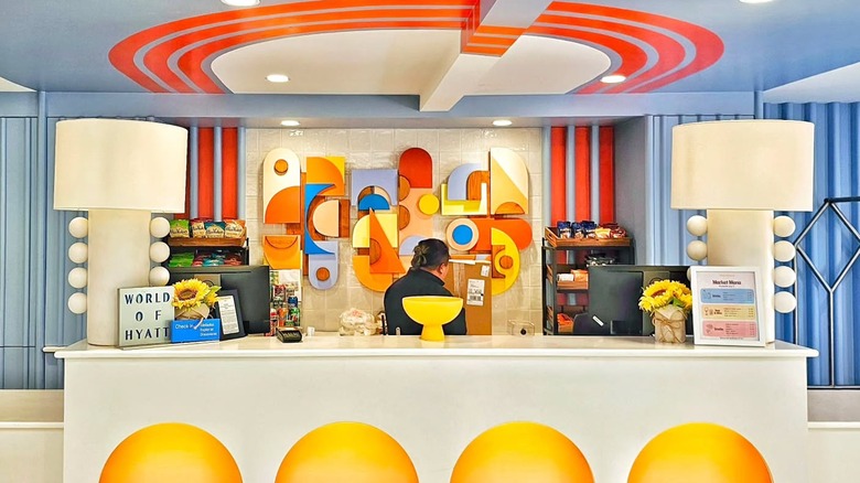 The abstract and colorful reception desk at Wild Palms Hotel
